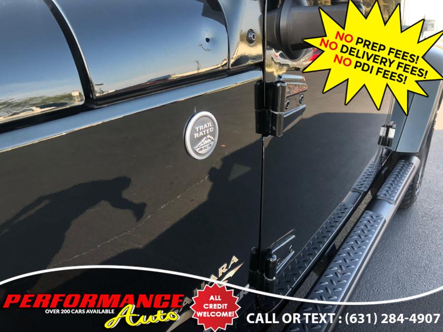 2012 Jeep Wrangler Unlimited 4WD 4dr Sahara, available for sale in Bohemia, New York | Performance Auto Inc. Bohemia, New York 2012 Jeep Wrangler Unlimited 4WD 4dr Sahara, available for sale in Bohemia, New York | Performance Auto Inc. Bohemia, New York