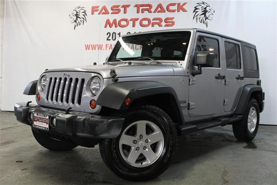 2013 Jeep Wrangler Unlimited SPORT, available for sale in Paterson, New Jersey | Fast Track Motors. Paterson, New Jersey