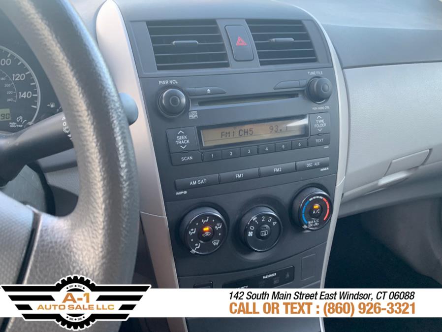 2009 Toyota Corolla 4dr Sdn Man, available for sale in East Windsor, Connecticut | A1 Auto Sale LLC. East Windsor, Connecticut 2009 Toyota Corolla 4dr Sdn Man, available for sale in East Windsor, Connecticut | A1 Auto Sale LLC. East Windsor, Connecticut