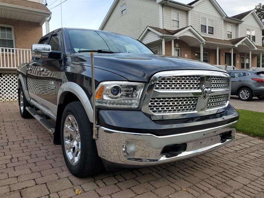 2015 Ram 1500 4WD Crew Cab 140.5" Laramie, available for sale in West Babylon, New York | SGM Auto Sales. West Babylon, New York