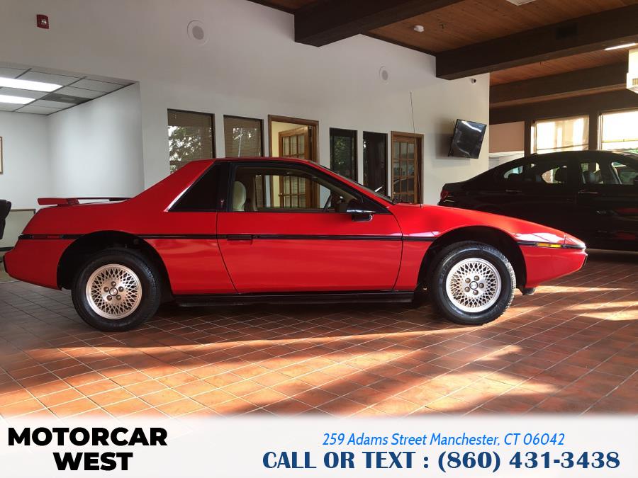 1984 Pontiac Fiero 2dr Coupe Sport 4-Spd, available for sale in Manchester, Connecticut | Motorcar West. Manchester, Connecticut 1984 Pontiac Fiero 2dr Coupe Sport 4-Spd, available for sale in Manchester, Connecticut | Motorcar West. Manchester, Connecticut