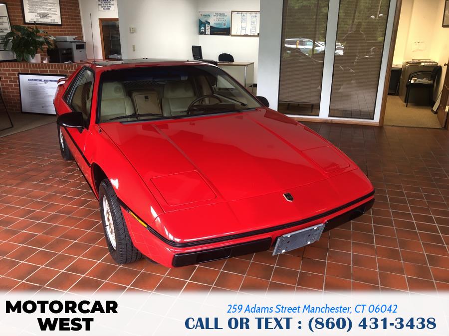 1984 Pontiac Fiero 2dr Coupe Sport 4-Spd, available for sale in Manchester, Connecticut | Motorcar West. Manchester, Connecticut 1984 Pontiac Fiero 2dr Coupe Sport 4-Spd, available for sale in Manchester, Connecticut | Motorcar West. Manchester, Connecticut