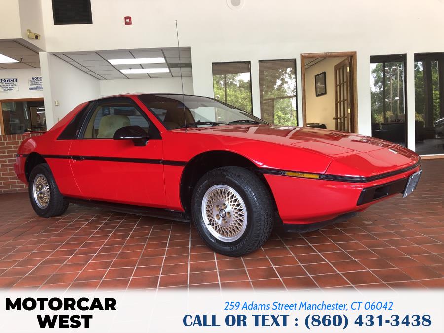 1984 Pontiac Fiero 2dr Coupe Sport 4-Spd, available for sale in Manchester, Connecticut | Motorcar West. Manchester, Connecticut 1984 Pontiac Fiero 2dr Coupe Sport 4-Spd, available for sale in Manchester, Connecticut | Motorcar West. Manchester, Connecticut