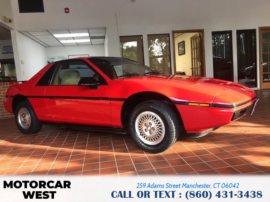 1984 Pontiac Fiero 2dr Coupe Sport 4-Spd, available for sale in Manchester, Connecticut | Motorcar West. Manchester, Connecticut 1984 Pontiac Fiero 2dr Coupe Sport 4-Spd, available for sale in Manchester, Connecticut | Motorcar West. Manchester, Connecticut