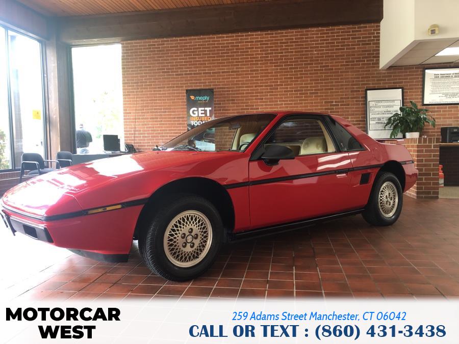1984 Pontiac Fiero 2dr Coupe Sport 4-Spd, available for sale in Manchester, Connecticut | Motorcar West. Manchester, Connecticut 1984 Pontiac Fiero 2dr Coupe Sport 4-Spd, available for sale in Manchester, Connecticut | Motorcar West. Manchester, Connecticut
