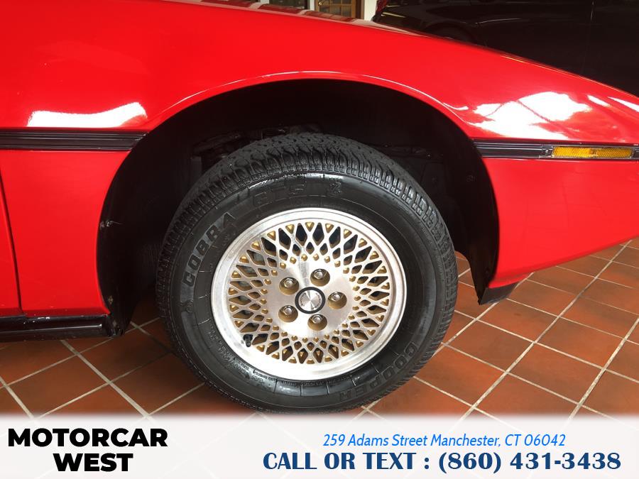 1984 Pontiac Fiero 2dr Coupe Sport 4-Spd, available for sale in Manchester, Connecticut | Motorcar West. Manchester, Connecticut 1984 Pontiac Fiero 2dr Coupe Sport 4-Spd, available for sale in Manchester, Connecticut | Motorcar West. Manchester, Connecticut