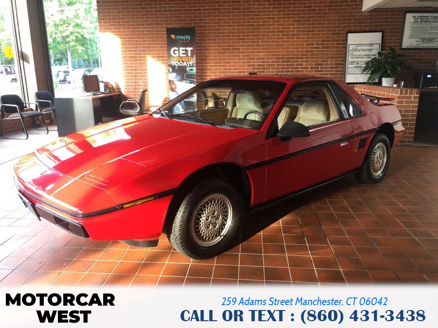 1984 Pontiac Fiero 2dr Coupe Sport 4-Spd, available for sale in Manchester, Connecticut | Motorcar West. Manchester, Connecticut 1984 Pontiac Fiero 2dr Coupe Sport 4-Spd, available for sale in Manchester, Connecticut | Motorcar West. Manchester, Connecticut