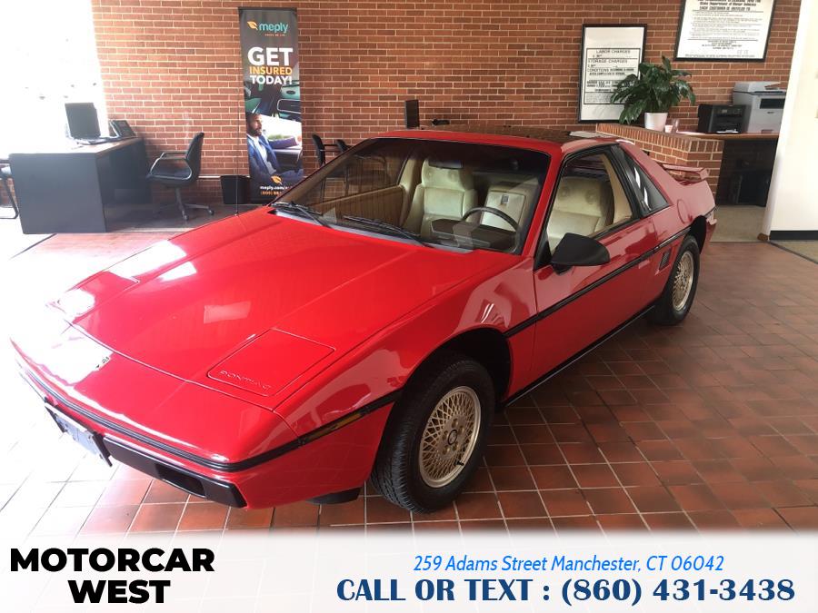 1984 Pontiac Fiero 2dr Coupe Sport 4-Spd, available for sale in Manchester, Connecticut | Motorcar West. Manchester, Connecticut 1984 Pontiac Fiero 2dr Coupe Sport 4-Spd, available for sale in Manchester, Connecticut | Motorcar West. Manchester, Connecticut