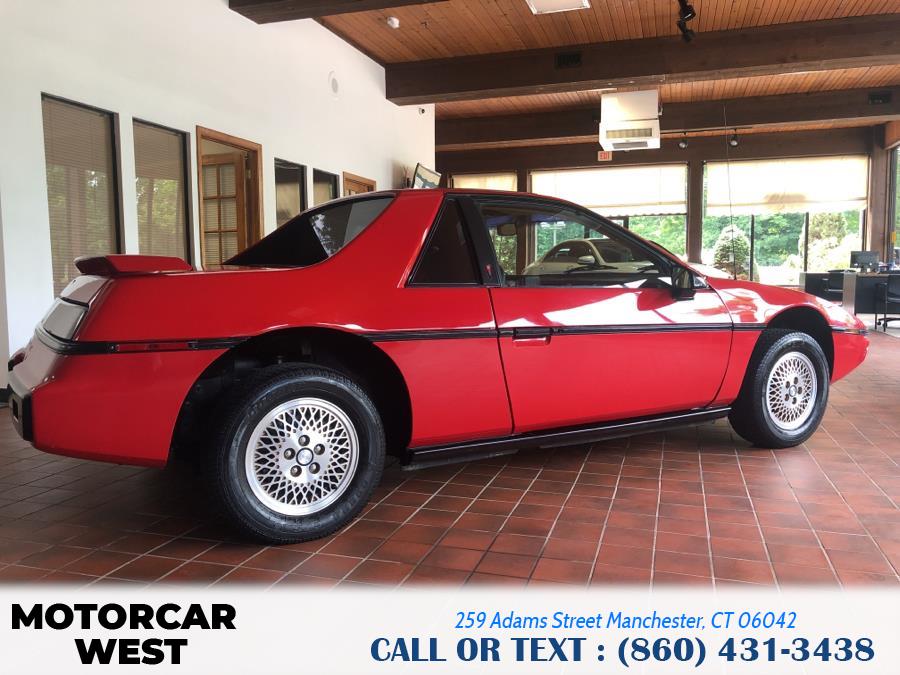 1984 Pontiac Fiero 2dr Coupe Sport 4-Spd, available for sale in Manchester, Connecticut | Motorcar West. Manchester, Connecticut 1984 Pontiac Fiero 2dr Coupe Sport 4-Spd, available for sale in Manchester, Connecticut | Motorcar West. Manchester, Connecticut