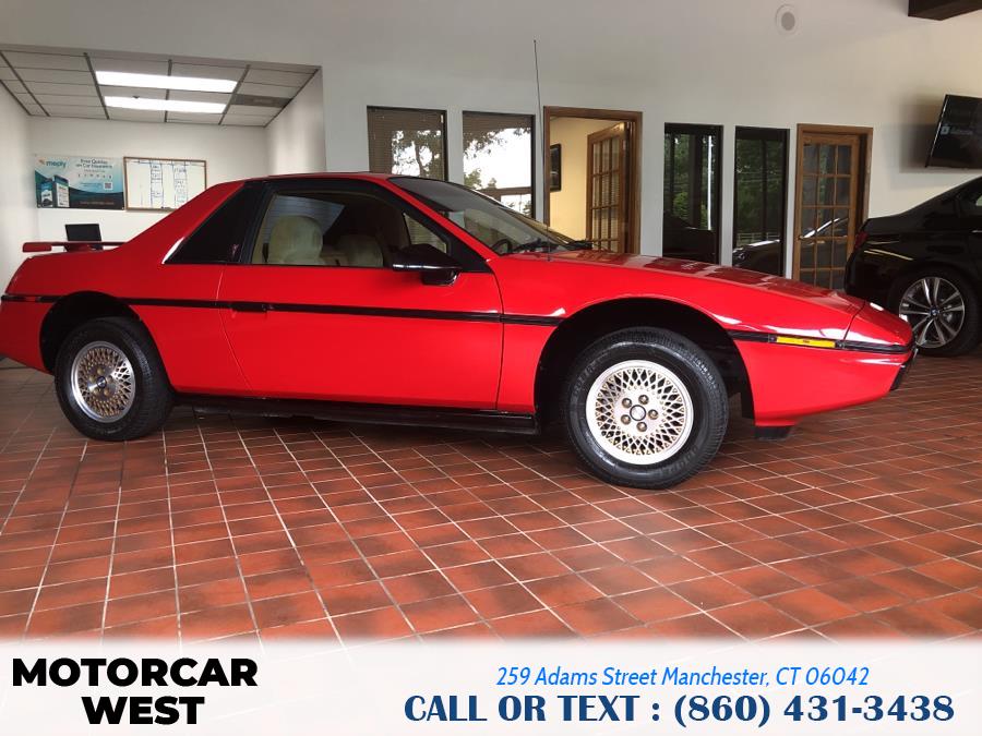 1984 Pontiac Fiero 2dr Coupe Sport 4-Spd, available for sale in Manchester, Connecticut | Motorcar West. Manchester, Connecticut 1984 Pontiac Fiero 2dr Coupe Sport 4-Spd, available for sale in Manchester, Connecticut | Motorcar West. Manchester, Connecticut