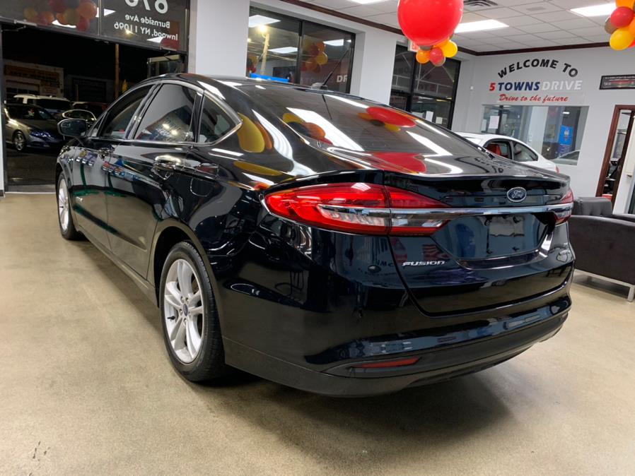 2018 Ford Fusion Hybrid SE FWD, available for sale in Inwood, New York | 5 Towns Drive. Inwood, New York 2018 Ford Fusion Hybrid SE FWD, available for sale in Inwood, New York | 5 Towns Drive. Inwood, New York