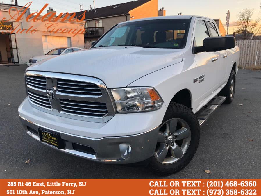 2014 Ram 1500 4WD Quad Cab 140.5" SLT, available for sale in Paterson, New Jersey | Adams Auto Group. Paterson, New Jersey