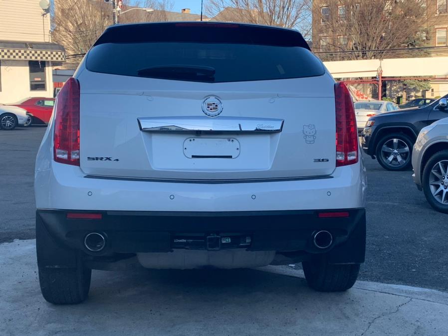 Used Cadillac SRX AWD 4dr Premium Collection 2015 | Champion Used Auto Sales 2. Newark , New Jersey Used Cadillac SRX AWD 4dr Premium Collection 2015 | Champion Used Auto Sales 2. Newark , New Jersey