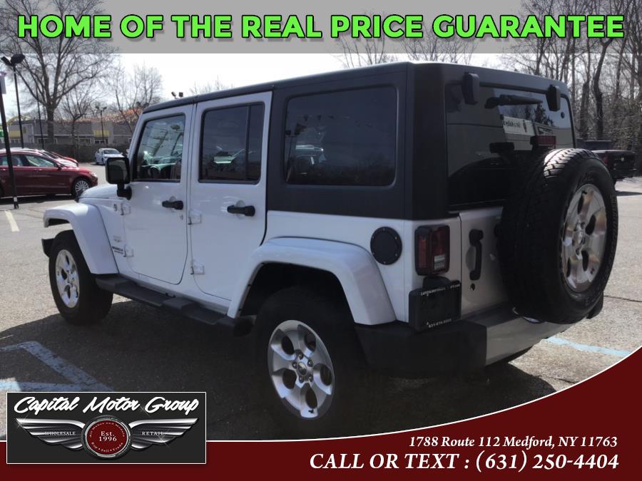 Used Jeep Wrangler Unlimited 4WD 4dr Altitude 2014 | Capital Motor Group Inc. Medford, New York Used Jeep Wrangler Unlimited 4WD 4dr Altitude 2014 | Capital Motor Group Inc. Medford, New York