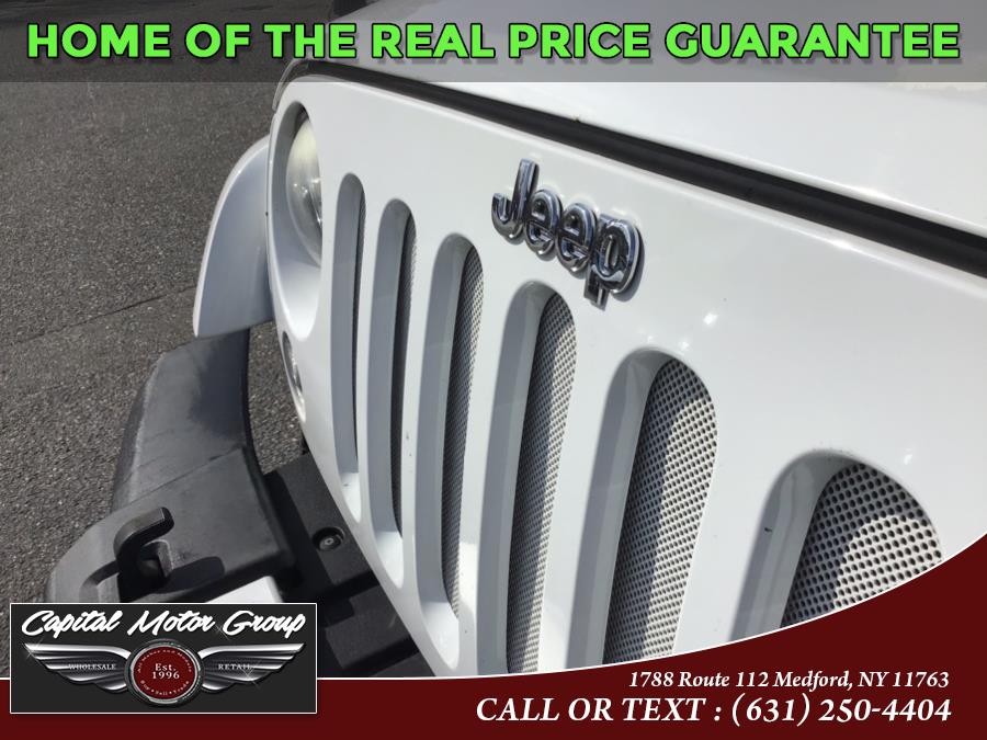 Used Jeep Wrangler Unlimited 4WD 4dr Altitude 2014 | Capital Motor Group Inc. Medford, New York Used Jeep Wrangler Unlimited 4WD 4dr Altitude 2014 | Capital Motor Group Inc. Medford, New York