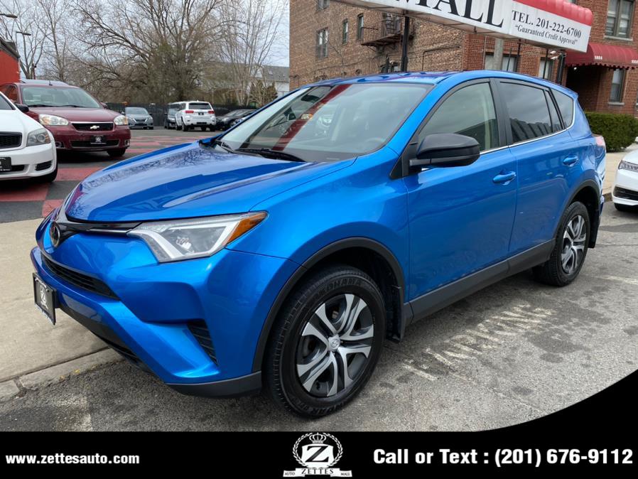 2018 Toyota RAV4 LE AWD (Natl), available for sale in Jersey City, New Jersey | Zettes Auto Mall. Jersey City, New Jersey 2018 Toyota RAV4 LE AWD (Natl), available for sale in Jersey City, New Jersey | Zettes Auto Mall. Jersey City, New Jersey