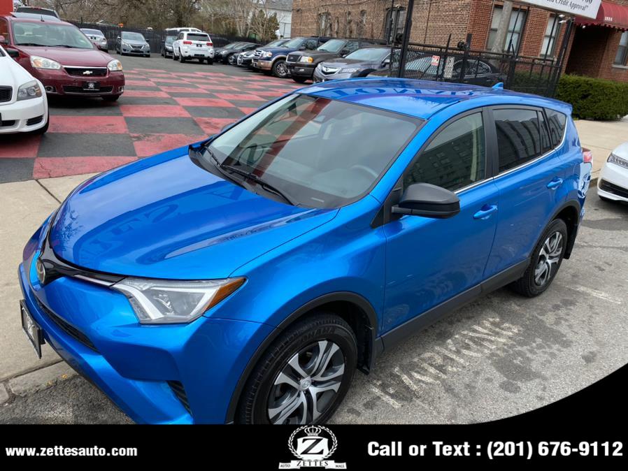 2018 Toyota RAV4 LE AWD (Natl), available for sale in Jersey City, New Jersey | Zettes Auto Mall. Jersey City, New Jersey 2018 Toyota RAV4 LE AWD (Natl), available for sale in Jersey City, New Jersey | Zettes Auto Mall. Jersey City, New Jersey