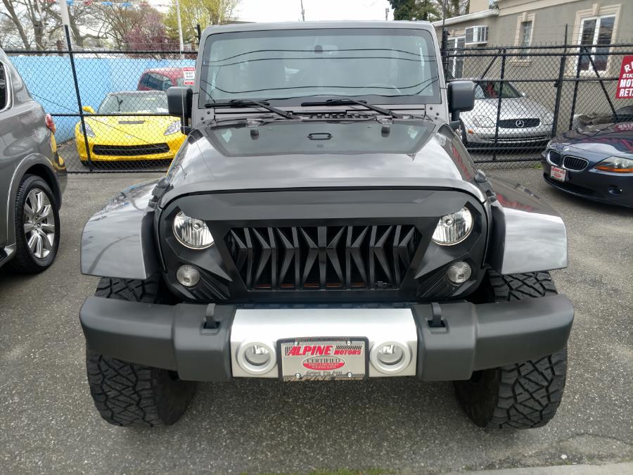 2014 Jeep Wrangler Unlimited 4WD 4dr Sahara, available for sale in Wantagh, New York | Alpine Motors Inc. Wantagh, New York 2014 Jeep Wrangler Unlimited 4WD 4dr Sahara, available for sale in Wantagh, New York | Alpine Motors Inc. Wantagh, New York