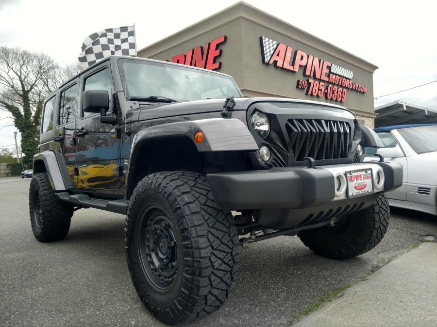 2014 Jeep Wrangler Unlimited 4WD 4dr Sahara, available for sale in Wantagh, New York | Alpine Motors Inc. Wantagh, New York 2014 Jeep Wrangler Unlimited 4WD 4dr Sahara, available for sale in Wantagh, New York | Alpine Motors Inc. Wantagh, New York