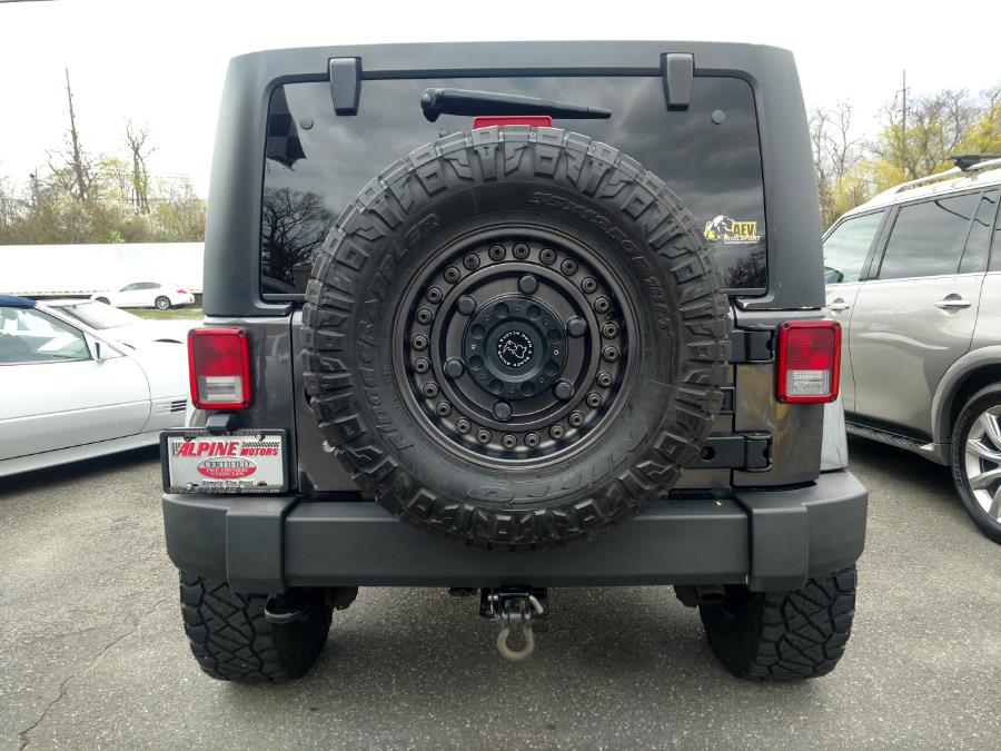 2014 Jeep Wrangler Unlimited 4WD 4dr Sahara, available for sale in Wantagh, New York | Alpine Motors Inc. Wantagh, New York 2014 Jeep Wrangler Unlimited 4WD 4dr Sahara, available for sale in Wantagh, New York | Alpine Motors Inc. Wantagh, New York