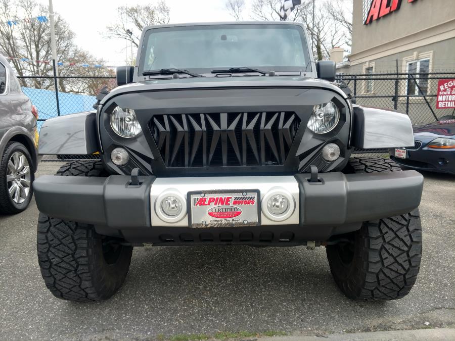 2014 Jeep Wrangler Unlimited 4WD 4dr Sahara, available for sale in Wantagh, New York | Alpine Motors Inc. Wantagh, New York 2014 Jeep Wrangler Unlimited 4WD 4dr Sahara, available for sale in Wantagh, New York | Alpine Motors Inc. Wantagh, New York