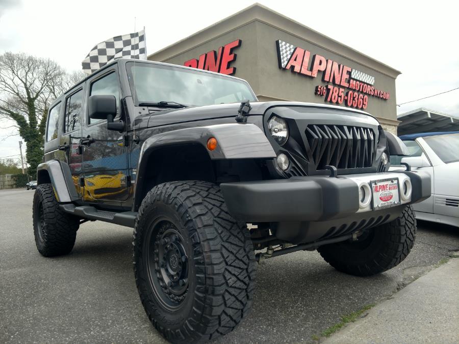 2014 Jeep Wrangler Unlimited 4WD 4dr Sahara, available for sale in Wantagh, New York | Alpine Motors Inc. Wantagh, New York 2014 Jeep Wrangler Unlimited 4WD 4dr Sahara, available for sale in Wantagh, New York | Alpine Motors Inc. Wantagh, New York