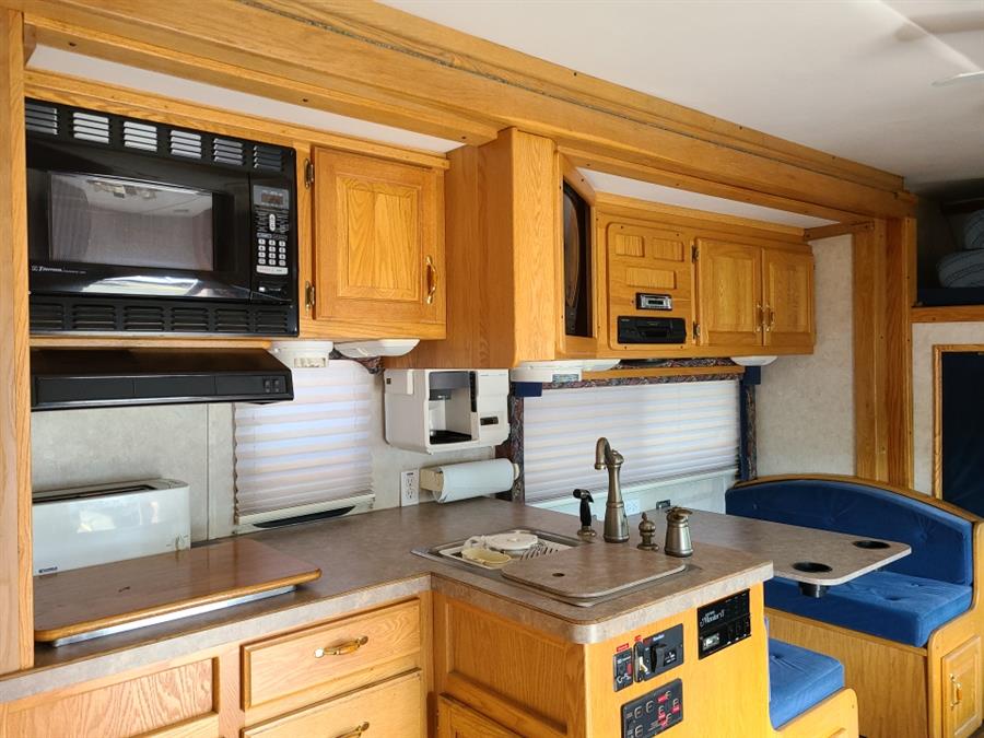 Used Freightliner 16/10 MG Camper Renegade Toy Hauler 2000 | National Auto Brokers, Inc.. Waterbury, Connecticut Used Freightliner 16/10 MG Camper Renegade Toy Hauler 2000 | National Auto Brokers, Inc.. Waterbury, Connecticut
