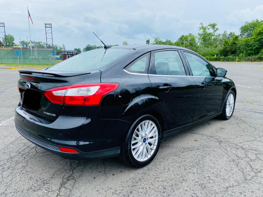 2014 Ford Focus 4dr Sdn Titanium, available for sale in New Britain, Connecticut | Supreme Automotive. New Britain, Connecticut 2014 Ford Focus 4dr Sdn Titanium, available for sale in New Britain, Connecticut | Supreme Automotive. New Britain, Connecticut