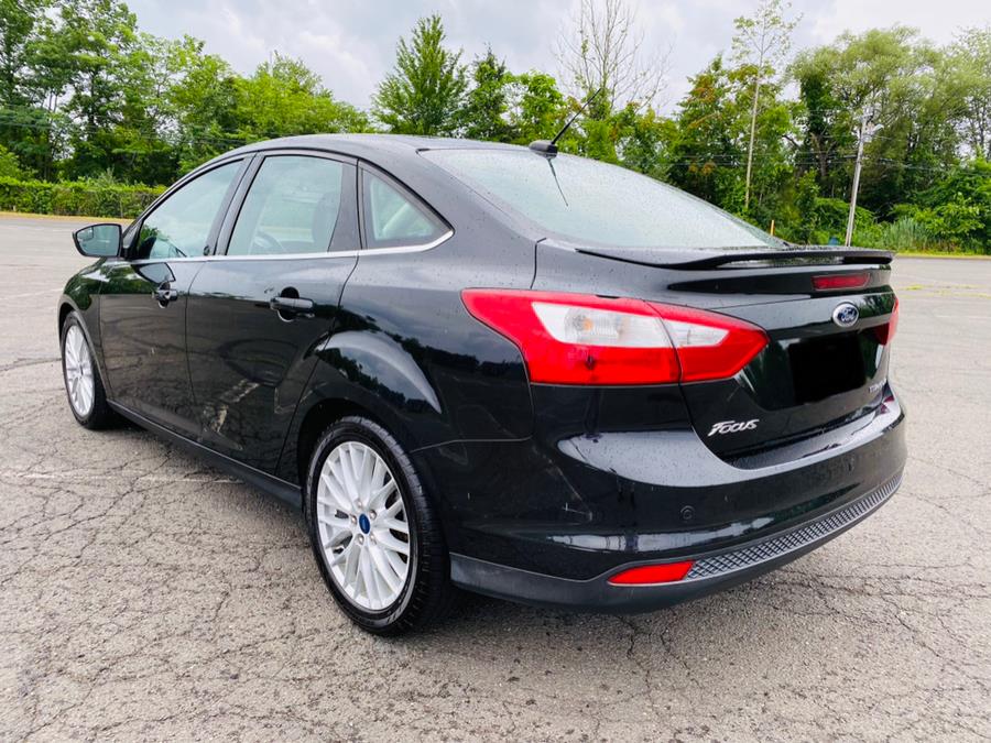 2014 Ford Focus 4dr Sdn Titanium, available for sale in New Britain, Connecticut | Supreme Automotive. New Britain, Connecticut 2014 Ford Focus 4dr Sdn Titanium, available for sale in New Britain, Connecticut | Supreme Automotive. New Britain, Connecticut