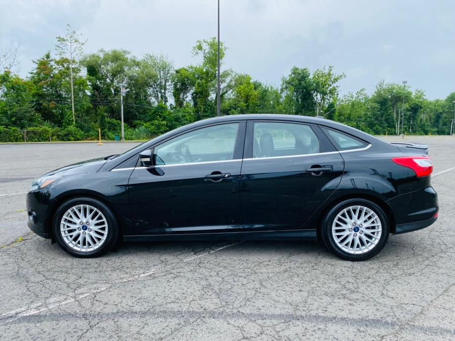 2014 Ford Focus 4dr Sdn Titanium, available for sale in New Britain, Connecticut | Supreme Automotive. New Britain, Connecticut 2014 Ford Focus 4dr Sdn Titanium, available for sale in New Britain, Connecticut | Supreme Automotive. New Britain, Connecticut