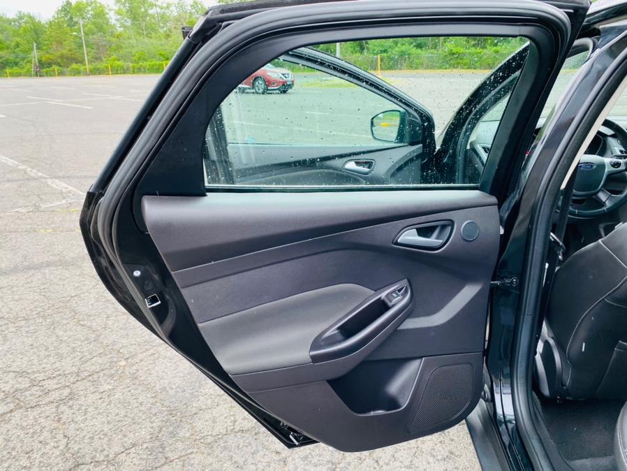 2014 Ford Focus 4dr Sdn Titanium, available for sale in New Britain, Connecticut | Supreme Automotive. New Britain, Connecticut 2014 Ford Focus 4dr Sdn Titanium, available for sale in New Britain, Connecticut | Supreme Automotive. New Britain, Connecticut