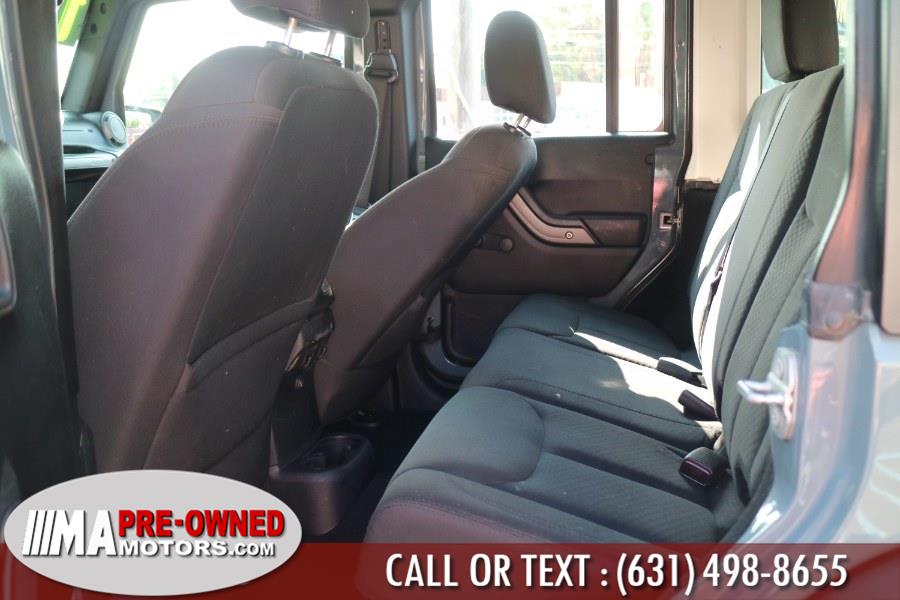 2015 Jeep Wrangler unLtd 4WD 4dr Sport, available for sale in Huntington Station, New York | M & A Motors. Huntington Station, New York 2015 Jeep Wrangler unLtd 4WD 4dr Sport, available for sale in Huntington Station, New York | M & A Motors. Huntington Station, New York