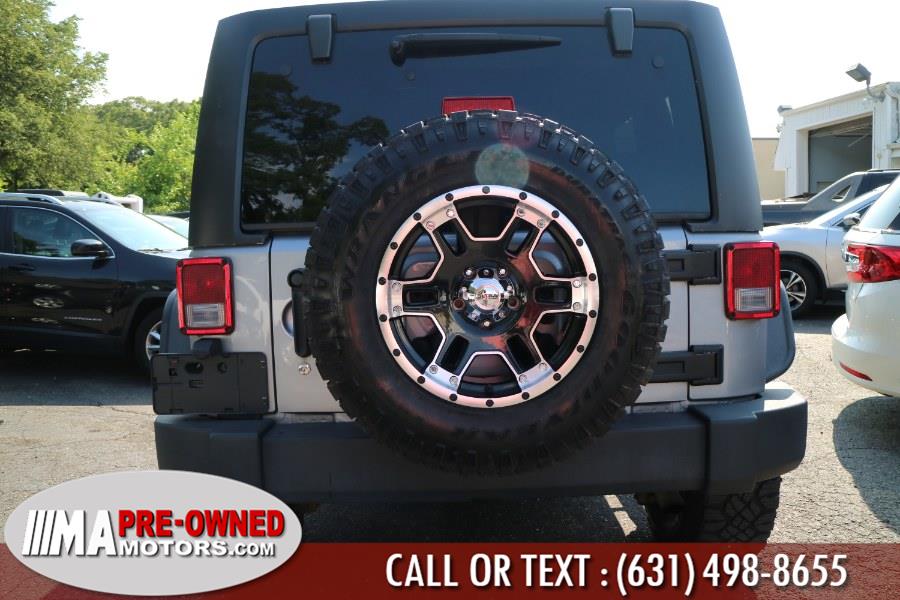 2015 Jeep Wrangler Unlimited 4WD 4dr Sport, available for sale in Huntington Station, New York | M & A Motors. Huntington Station, New York 2015 Jeep Wrangler Unlimited 4WD 4dr Sport, available for sale in Huntington Station, New York | M & A Motors. Huntington Station, New York
