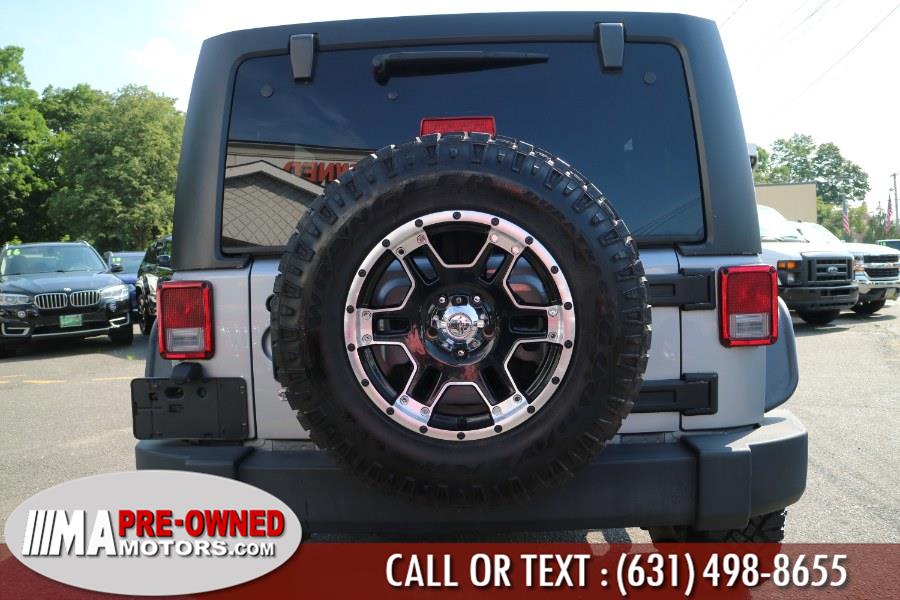 2015 Jeep Wrangler Unlimited 4WD 4dr Sport, available for sale in Huntington Station, New York | M & A Motors. Huntington Station, New York 2015 Jeep Wrangler Unlimited 4WD 4dr Sport, available for sale in Huntington Station, New York | M & A Motors. Huntington Station, New York