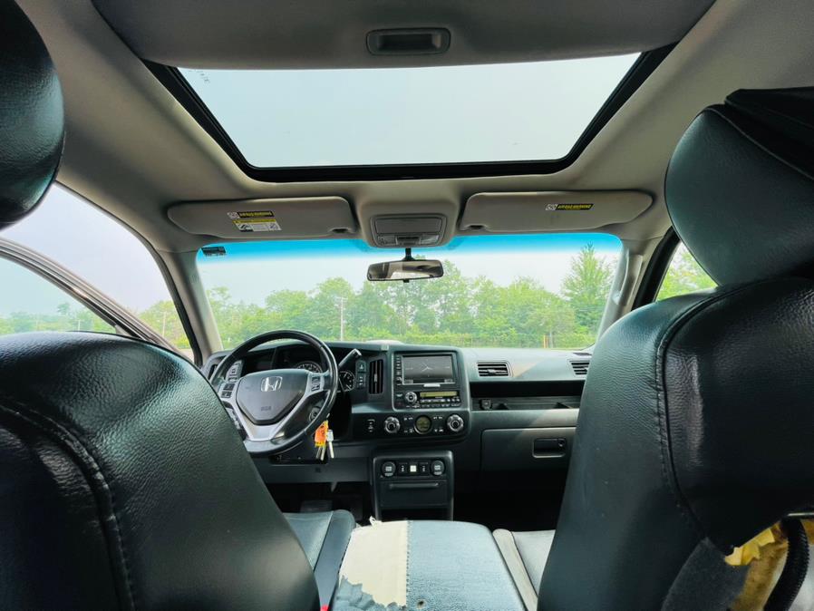 2011 Honda Ridgeline 4WD Crew Cab RTL w/Navi, available for sale in New Britain, Connecticut | Supreme Automotive. New Britain, Connecticut 2011 Honda Ridgeline 4WD Crew Cab RTL w/Navi, available for sale in New Britain, Connecticut | Supreme Automotive. New Britain, Connecticut