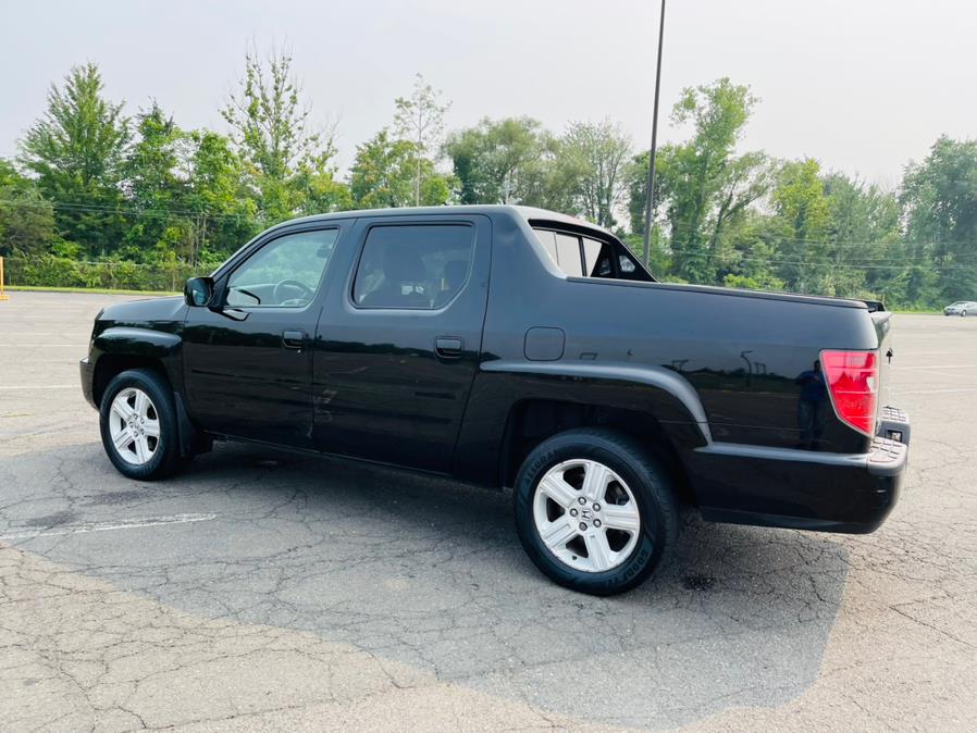 2011 Honda Ridgeline 4WD Crew Cab RTL w/Navi, available for sale in New Britain, Connecticut | Supreme Automotive. New Britain, Connecticut 2011 Honda Ridgeline 4WD Crew Cab RTL w/Navi, available for sale in New Britain, Connecticut | Supreme Automotive. New Britain, Connecticut