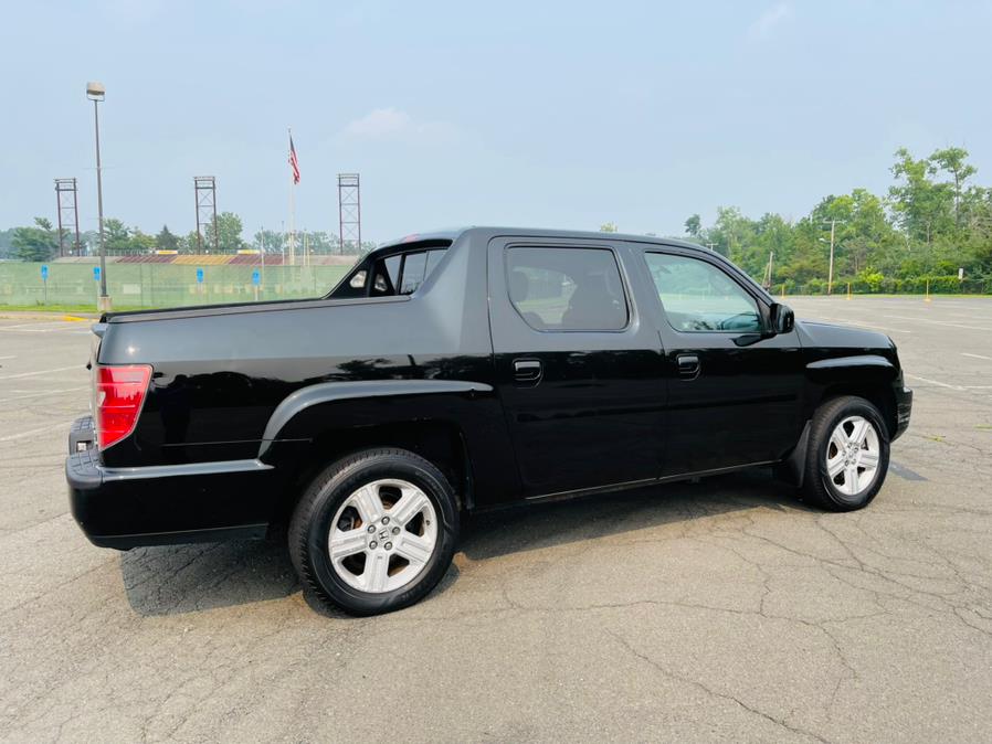2011 Honda Ridgeline 4WD Crew Cab RTL w/Navi, available for sale in New Britain, Connecticut | Supreme Automotive. New Britain, Connecticut 2011 Honda Ridgeline 4WD Crew Cab RTL w/Navi, available for sale in New Britain, Connecticut | Supreme Automotive. New Britain, Connecticut