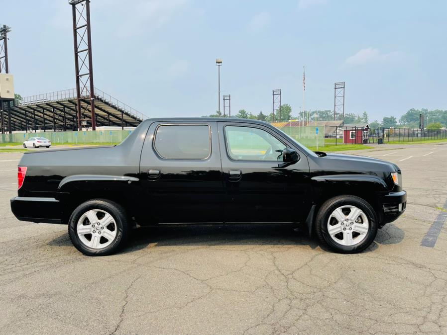 2011 Honda Ridgeline 4WD Crew Cab RTL w/Navi, available for sale in New Britain, Connecticut | Supreme Automotive. New Britain, Connecticut 2011 Honda Ridgeline 4WD Crew Cab RTL w/Navi, available for sale in New Britain, Connecticut | Supreme Automotive. New Britain, Connecticut