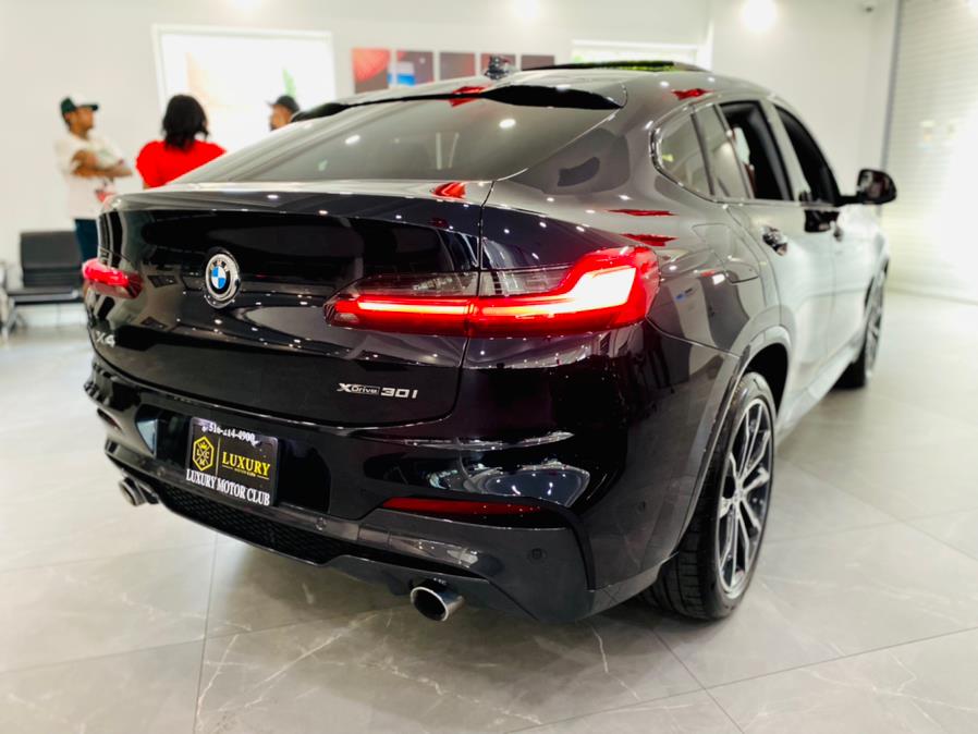 Used BMW X4 xDrive30i Sports Activity Coupe 2021 | Luxury Motor Club. Franklin Square, New York Used BMW X4 xDrive30i Sports Activity Coupe 2021 | Luxury Motor Club. Franklin Square, New York