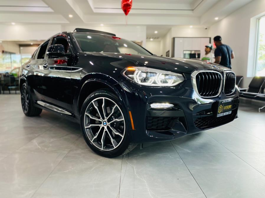 Used BMW X4 xDrive30i Sports Activity Coupe 2021 | Luxury Motor Club. Franklin Square, New York Used BMW X4 xDrive30i Sports Activity Coupe 2021 | Luxury Motor Club. Franklin Square, New York