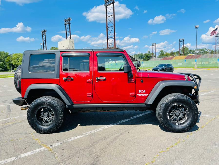 Used Jeep Wrangler Unlimited 4WD 4dr X 2009 | Supreme Automotive. New Britain, Connecticut Used Jeep Wrangler Unlimited 4WD 4dr X 2009 | Supreme Automotive. New Britain, Connecticut