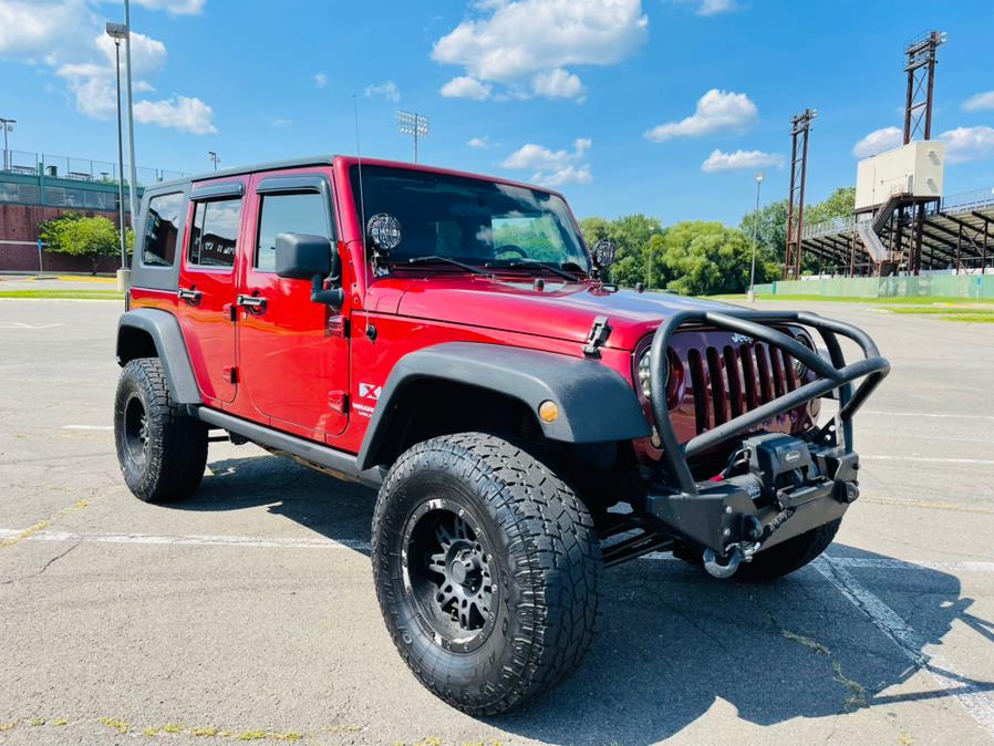 2009 Jeep Wrangler Unlimited 4WD 4dr X, available for sale in New Britain, Connecticut | Supreme Automotive. New Britain, Connecticut