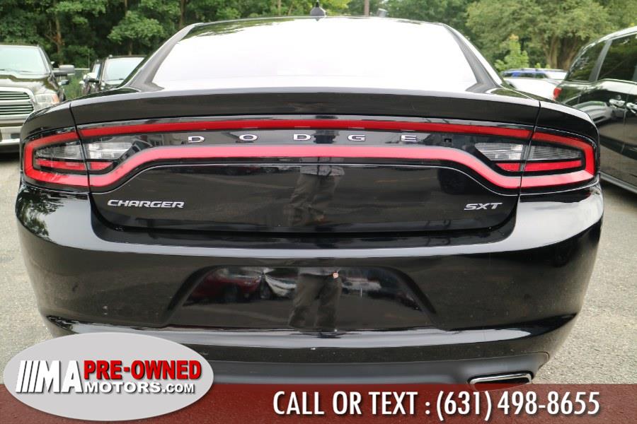 2016 Dodge Charger 4dr Sdn SXT RWD, available for sale in Huntington Station, New York | M & A Motors. Huntington Station, New York 2016 Dodge Charger 4dr Sdn SXT RWD, available for sale in Huntington Station, New York | M & A Motors. Huntington Station, New York