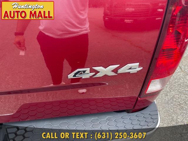 2014 Ram 1500 4WD Quad Cab 140.5" Big Horn, available for sale in Huntington Station, New York | Huntington Auto Mall. Huntington Station, New York 2014 Ram 1500 4WD Quad Cab 140.5" Big Horn, available for sale in Huntington Station, New York | Huntington Auto Mall. Huntington Station, New York