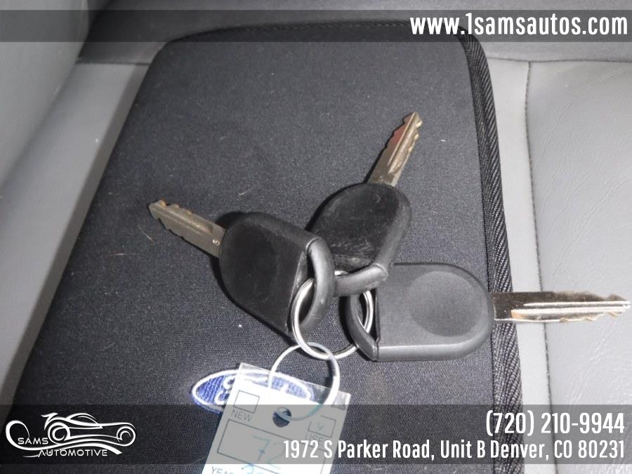 2003 Ford Explorer Sport Trac 4, available for sale in Denver, Colorado | Sam's Automotive. Denver, Colorado 2003 Ford Explorer Sport Trac 4, available for sale in Denver, Colorado | Sam's Automotive. Denver, Colorado