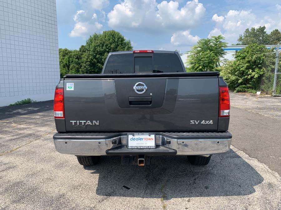 2012 Nissan Titan 4WD King Cab SWB SV, available for sale in Milford, Connecticut | Dealertown Auto Wholesalers. Milford, Connecticut 2012 Nissan Titan 4WD King Cab SWB SV, available for sale in Milford, Connecticut | Dealertown Auto Wholesalers. Milford, Connecticut
