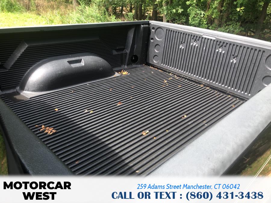 Used Ram 1500 4WD Quad Cab 140.5" SLT 2012 | Motorcar West. Manchester, Connecticut Used Ram 1500 4WD Quad Cab 140.5" SLT 2012 | Motorcar West. Manchester, Connecticut