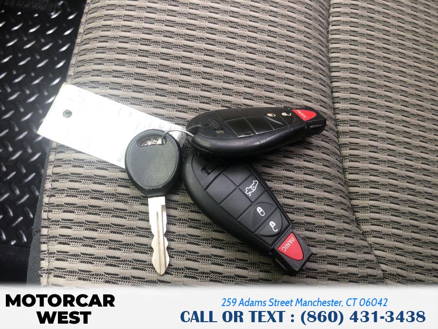 Used Ram 1500 4WD Quad Cab 140.5" SLT 2012 | Motorcar West. Manchester, Connecticut Used Ram 1500 4WD Quad Cab 140.5" SLT 2012 | Motorcar West. Manchester, Connecticut