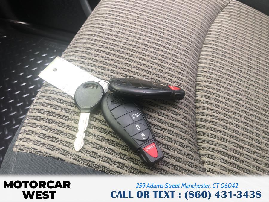 Used Ram 1500 4WD Quad Cab 140.5" SLT 2012 | Motorcar West. Manchester, Connecticut Used Ram 1500 4WD Quad Cab 140.5" SLT 2012 | Motorcar West. Manchester, Connecticut