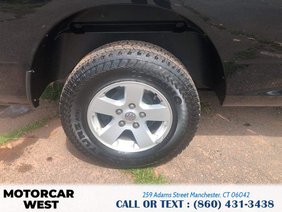 Used Ram 1500 4WD Quad Cab 140.5" SLT 2012 | Motorcar West. Manchester, Connecticut Used Ram 1500 4WD Quad Cab 140.5" SLT 2012 | Motorcar West. Manchester, Connecticut